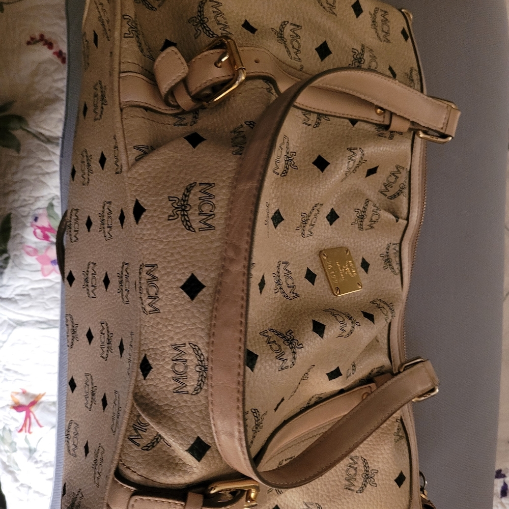 MCM bag in cream.